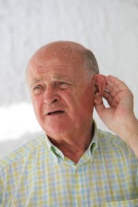 Elderly man hard of hearing